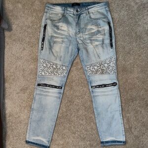 AMIRI Relaxed Blue and Black Jeans with Moto Zipper Details